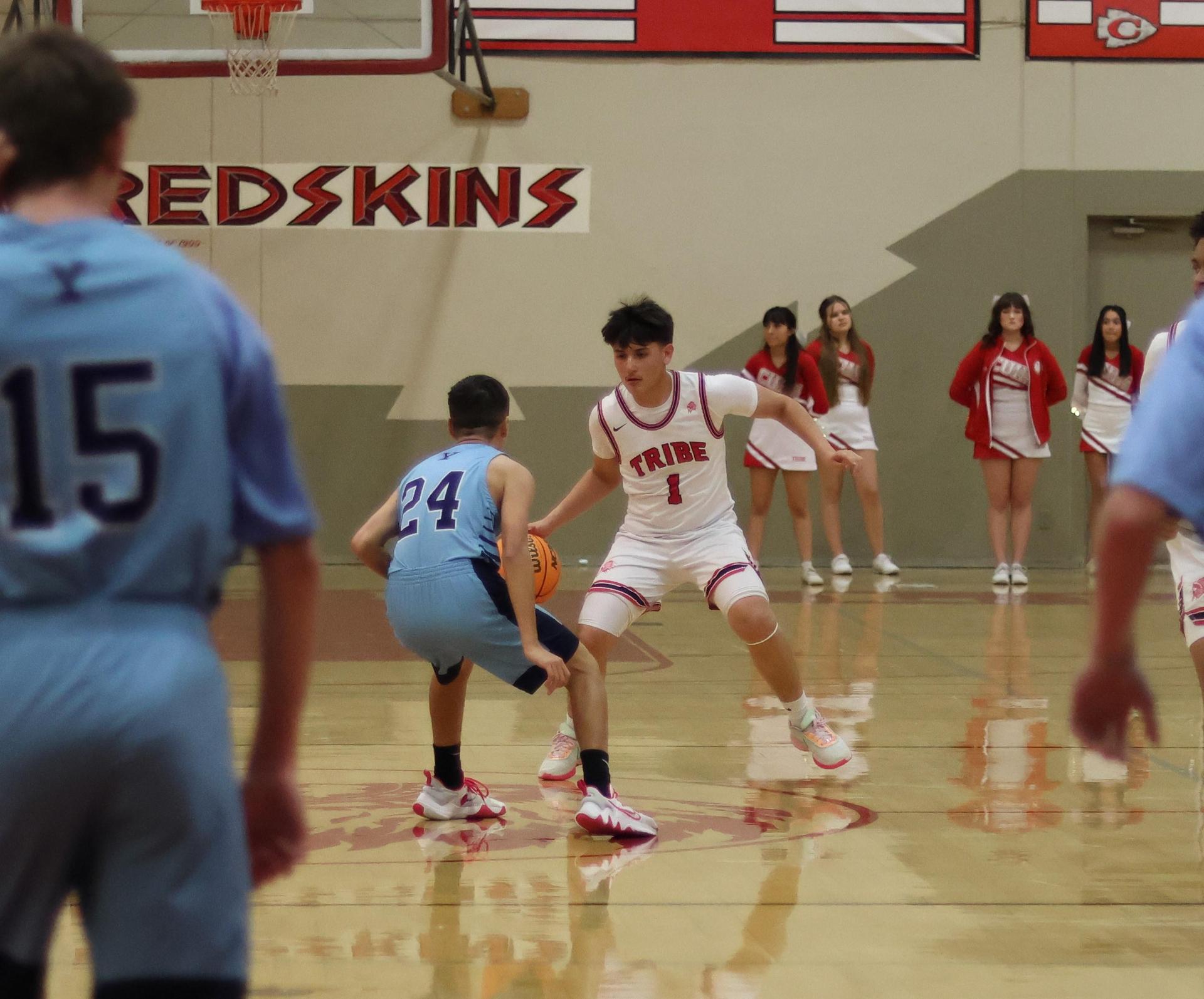 junior varsity boys playing basketball against yosemite