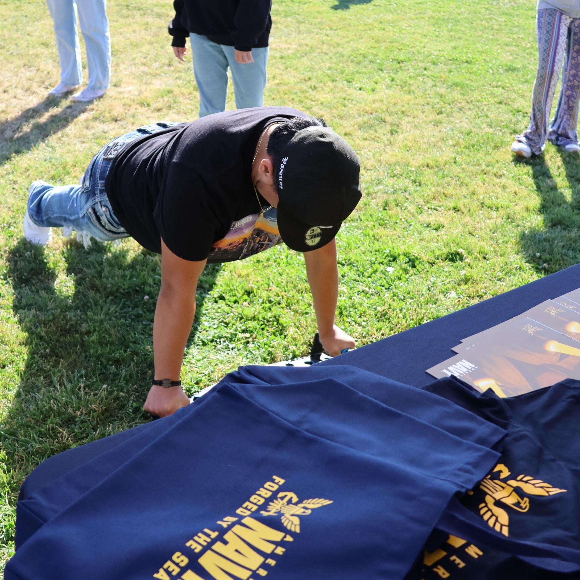 Navy recruiters speaking to students