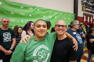 People shaving heads for cancer research