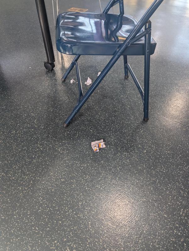 paper trash on floor