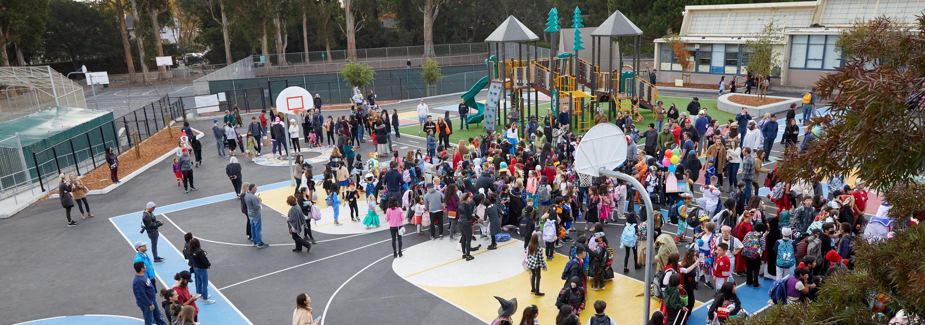 Lincoln families gathering at the playground before school.