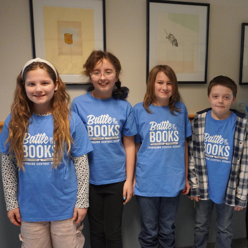 Battle of the books team in blue shirts
