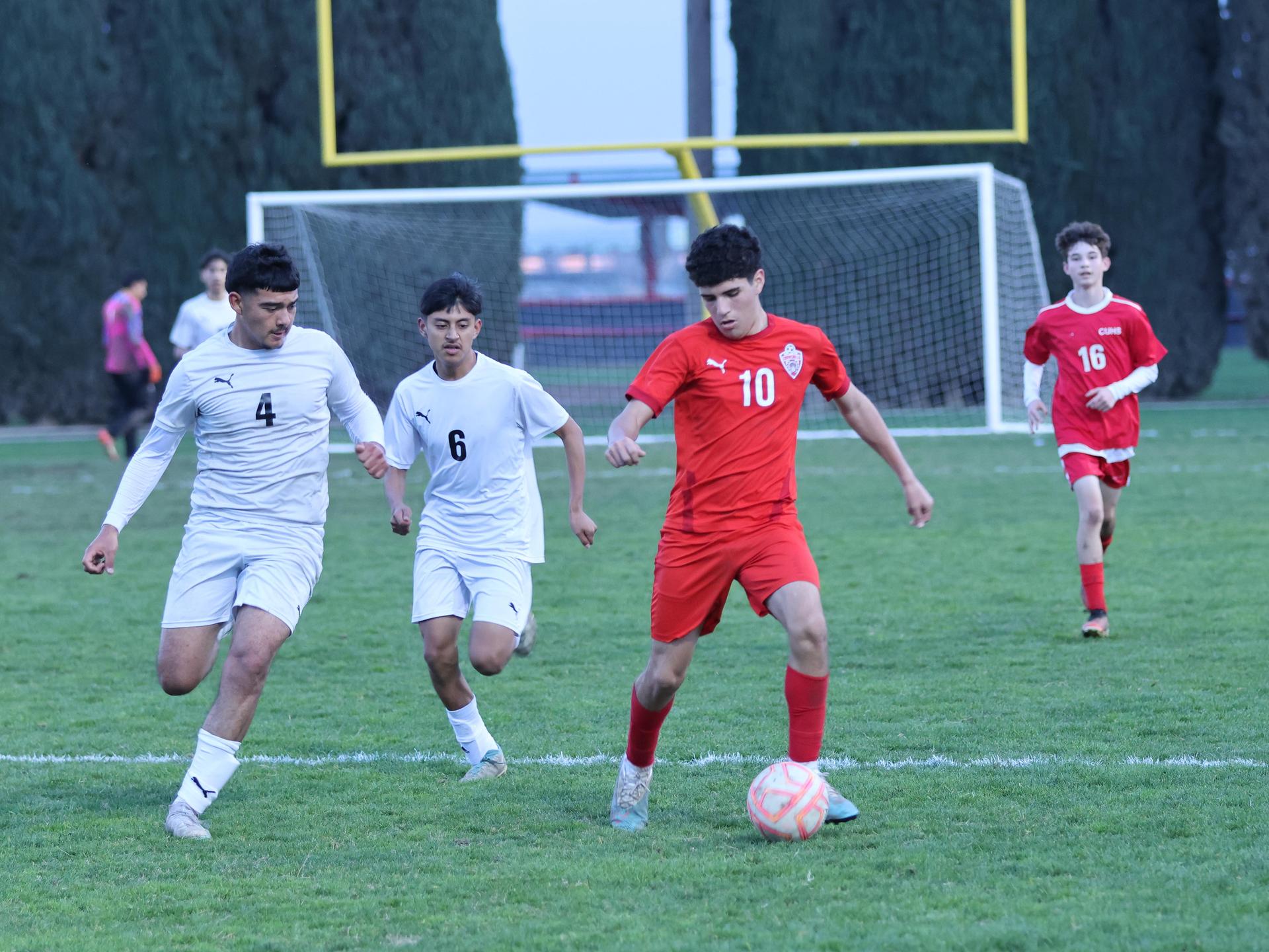 junior varsity boys playing soccer against washington union