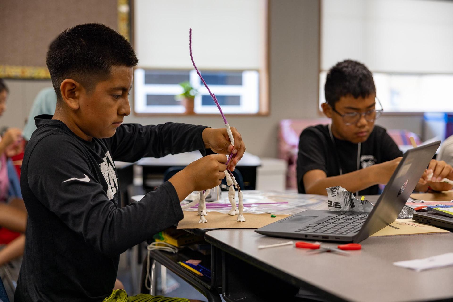 Magnolia Students performing STEM Activities