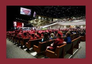 GHS graduation with maroon gowns and caps