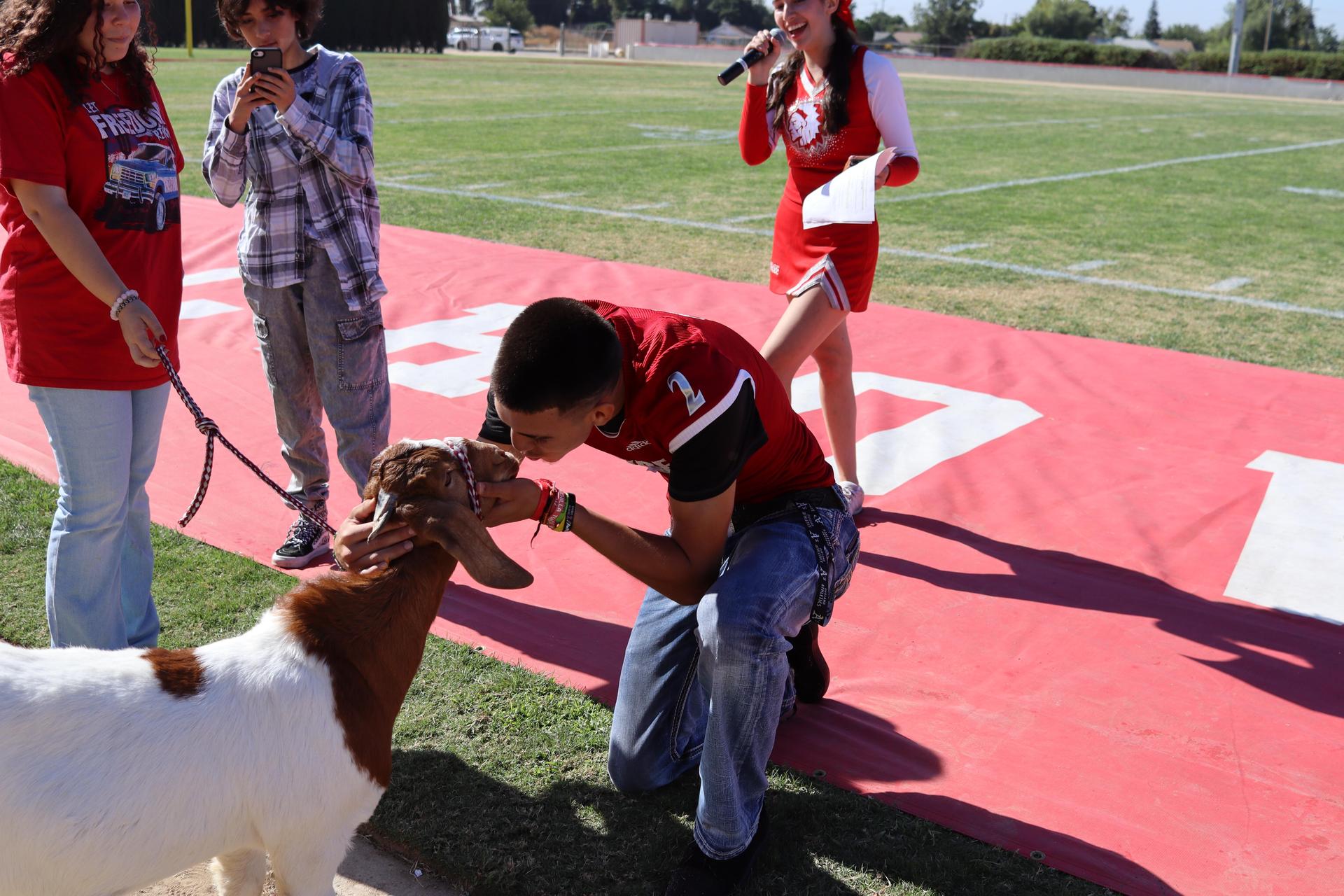 students and staff at the homecoming rally