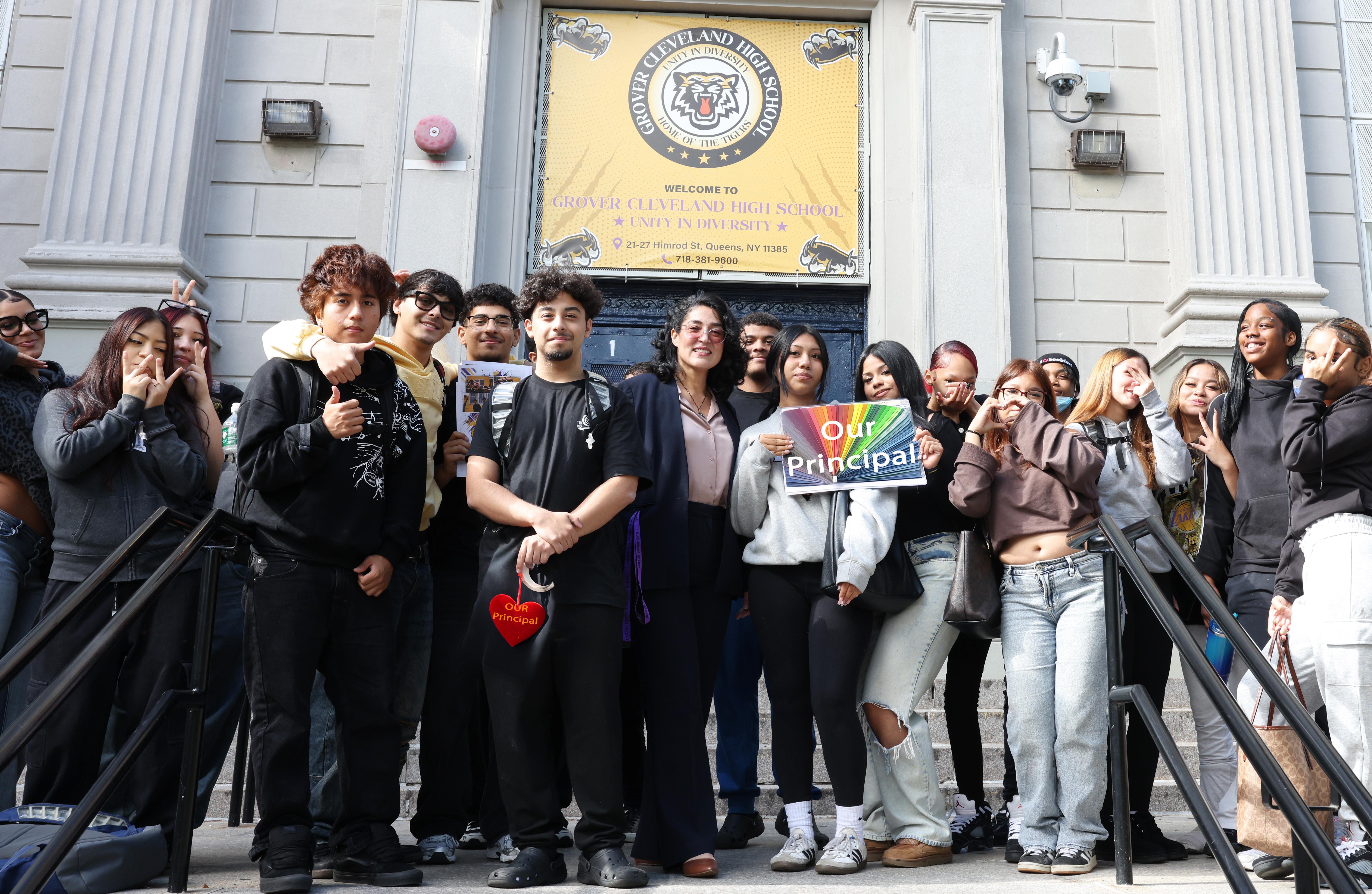 Principal Toro in Front of the school with students