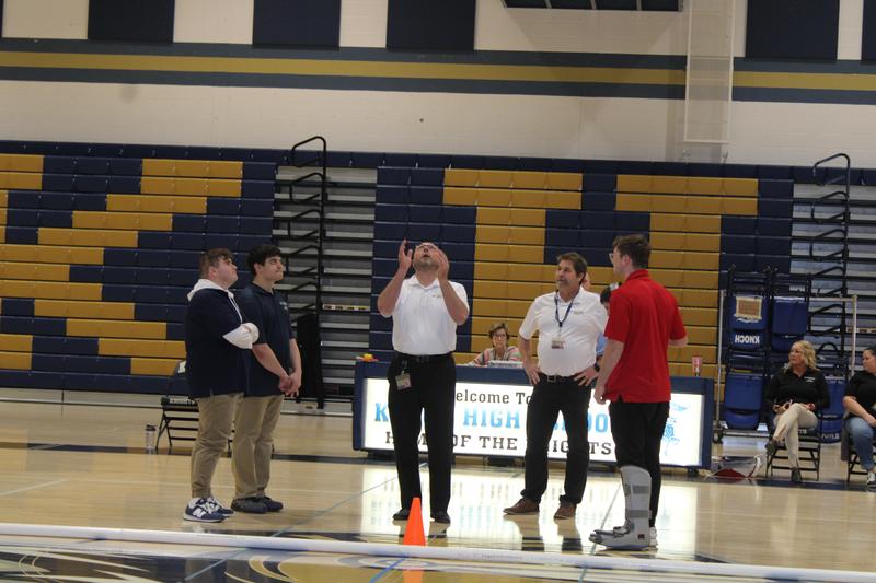 team captains watching refs flip coin
