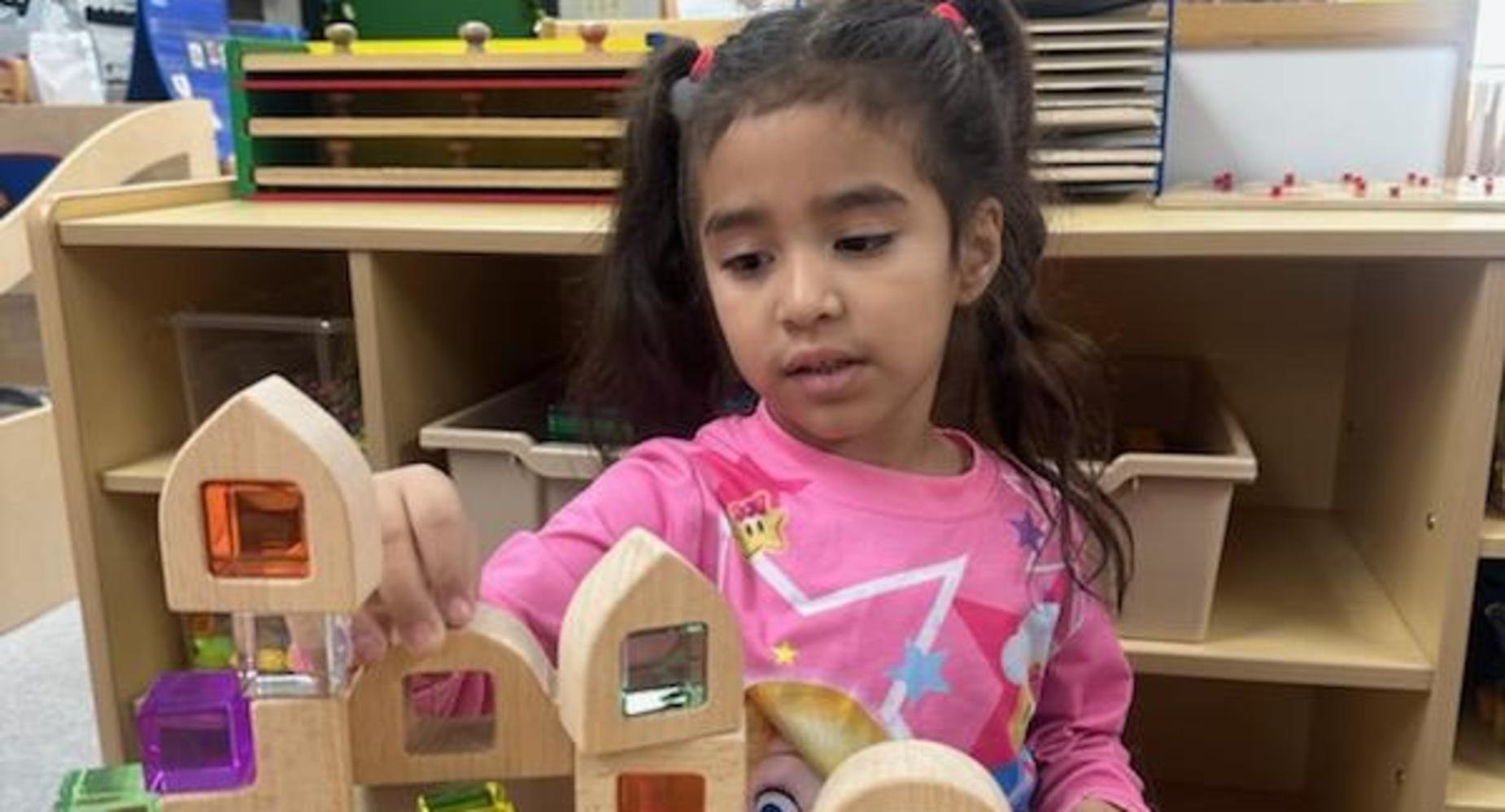 Child building with blocks