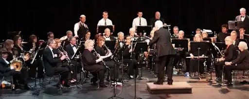 suburban concert band performance with conductor