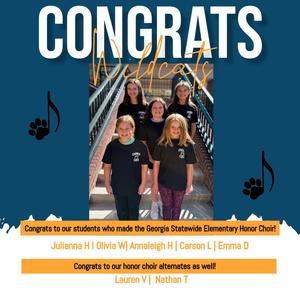 group of students standing on the steps