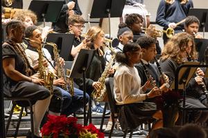 Eighth grade band members perform