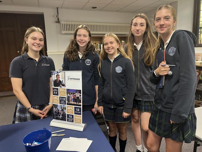 Picture of the week: Alumn Lily Carpenter, represented Fontbonne Academy at The High School Fair this week. Great to see her reuniting with our grade 8 students.