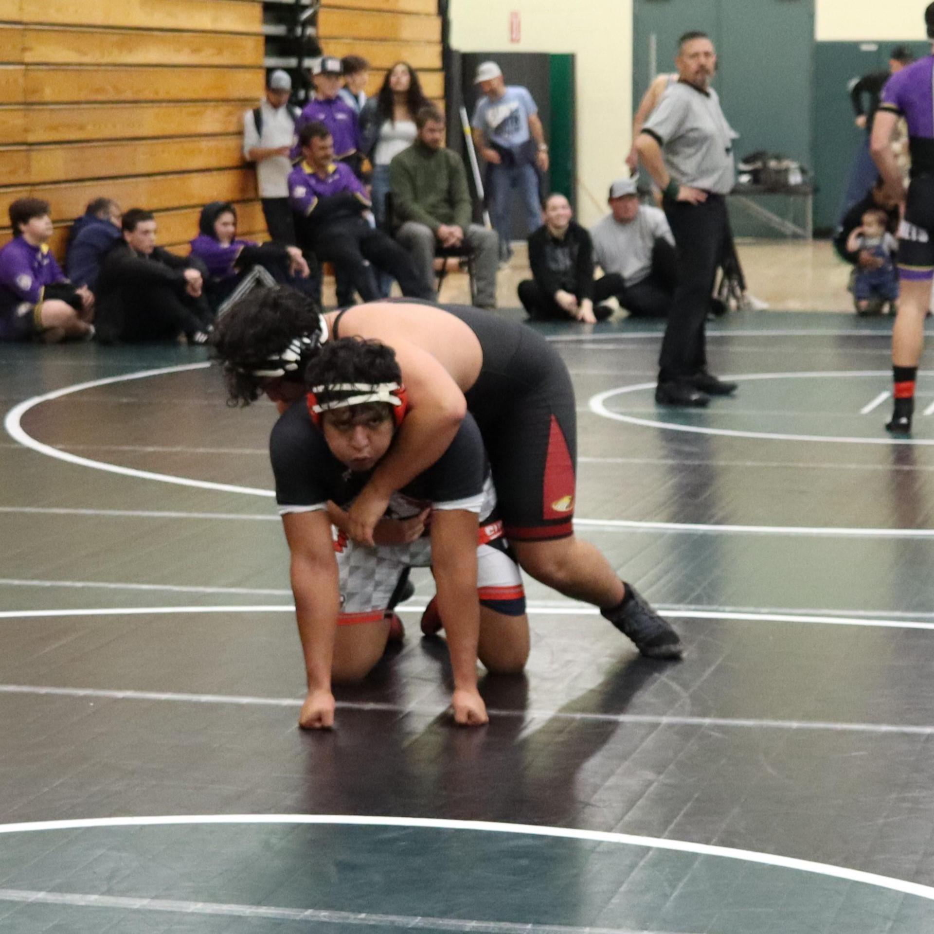 wrestlers in action at the Hawks invitational