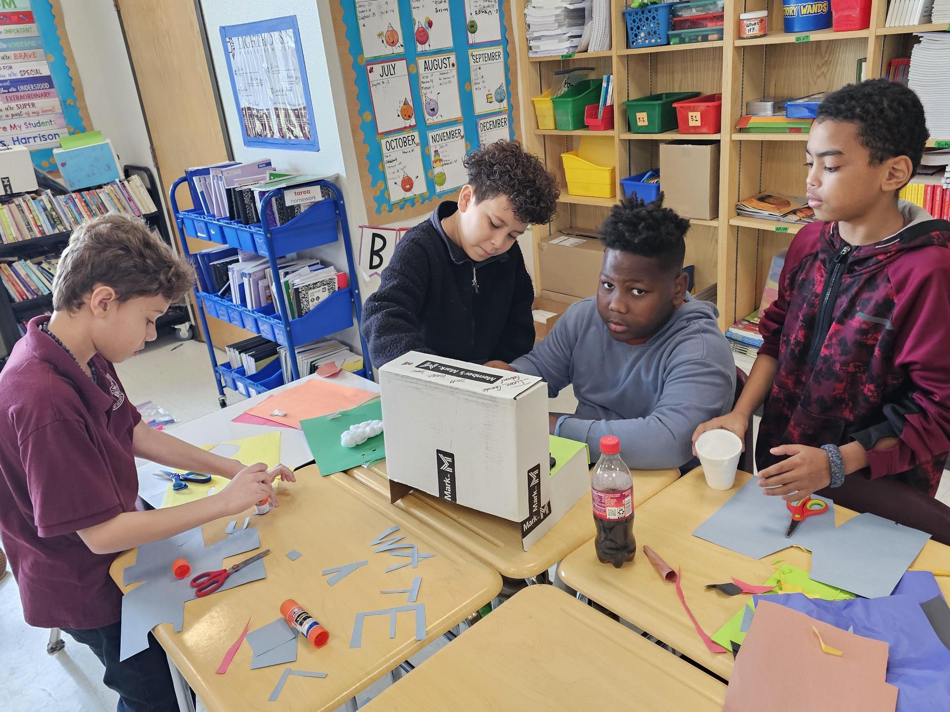 5.2 Working on their Water Cycle project