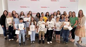 Everyone who went to Toyota in front of white backdrop