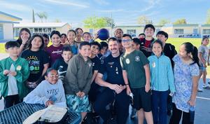 Schweitzer Students with Anaheim PD officer