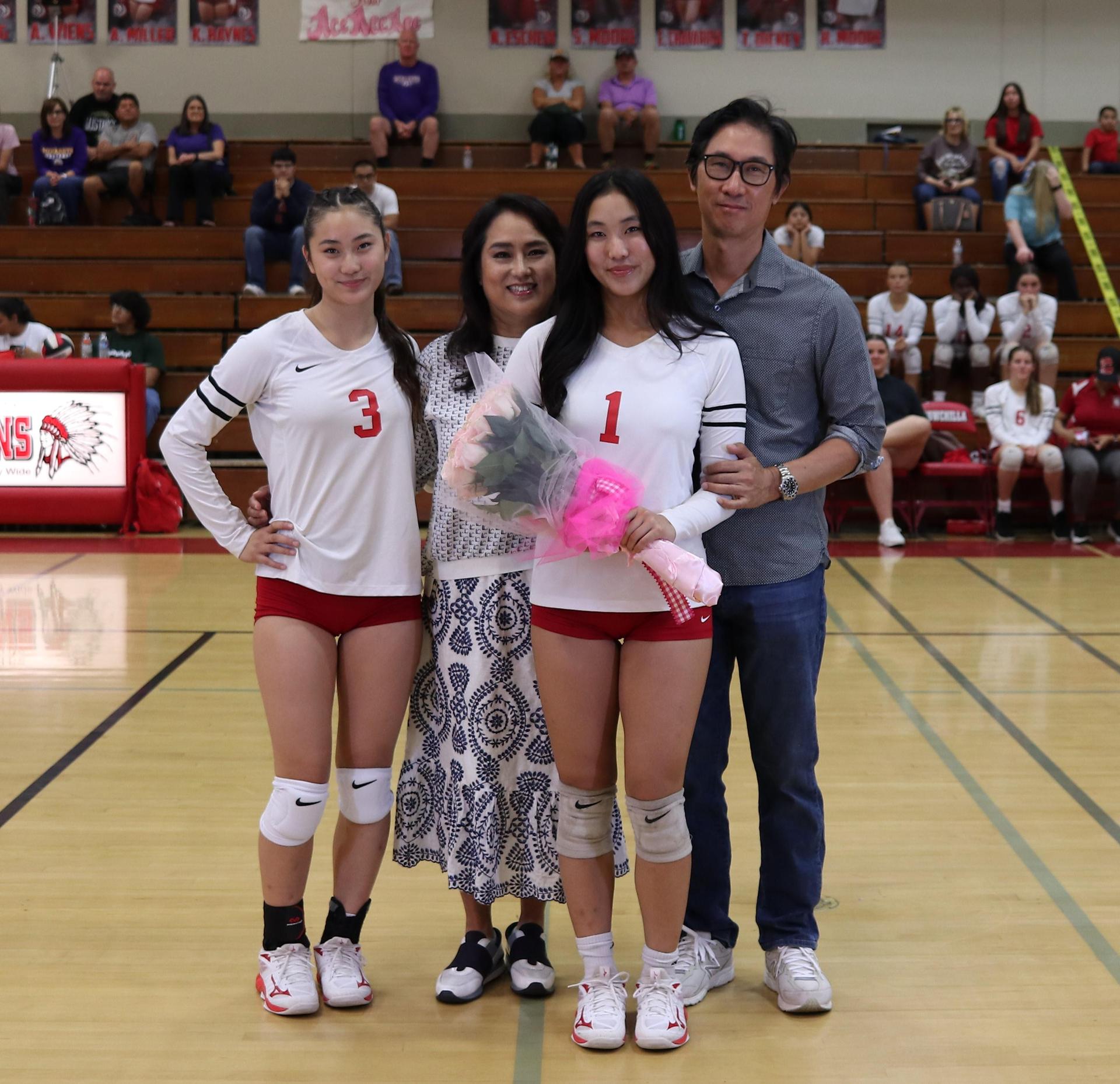 senior players and their escorts enjoying Senior Night