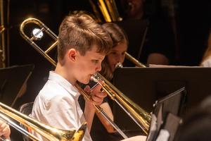 A band member performs