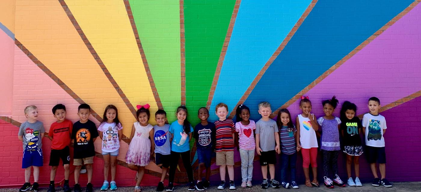 rainbow over students