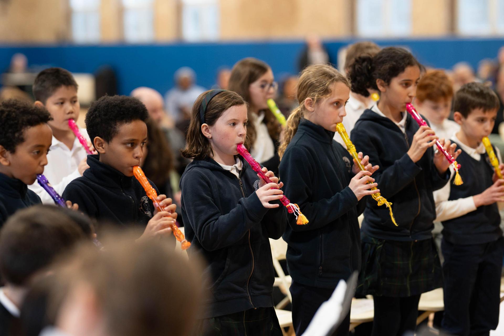 Children playing recorder