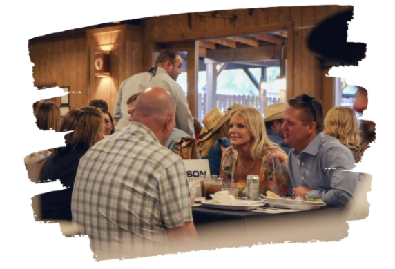 Spring Fling photo of people enjoying dinner and mingling