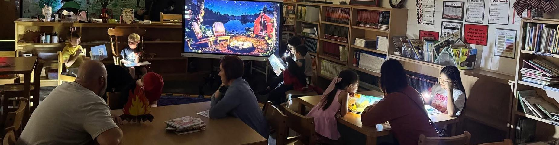 Picture of families reading together.