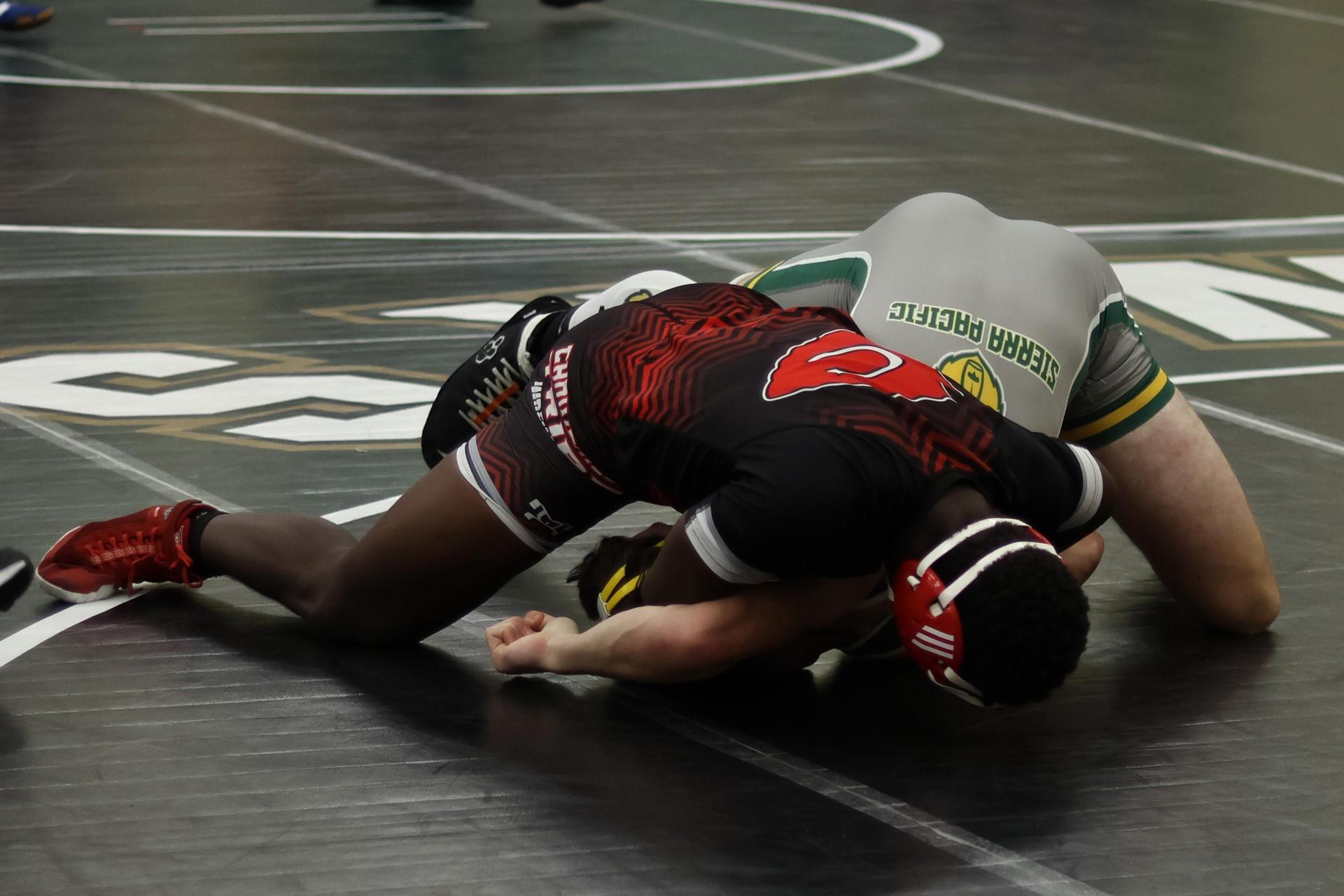 boys wrestling at liberty duals