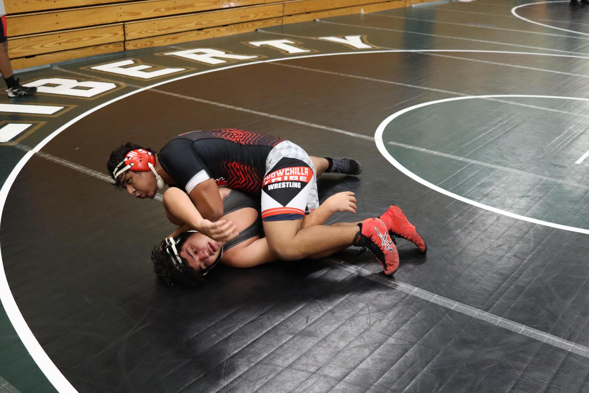 wrestlers in action at the Hawks invitational