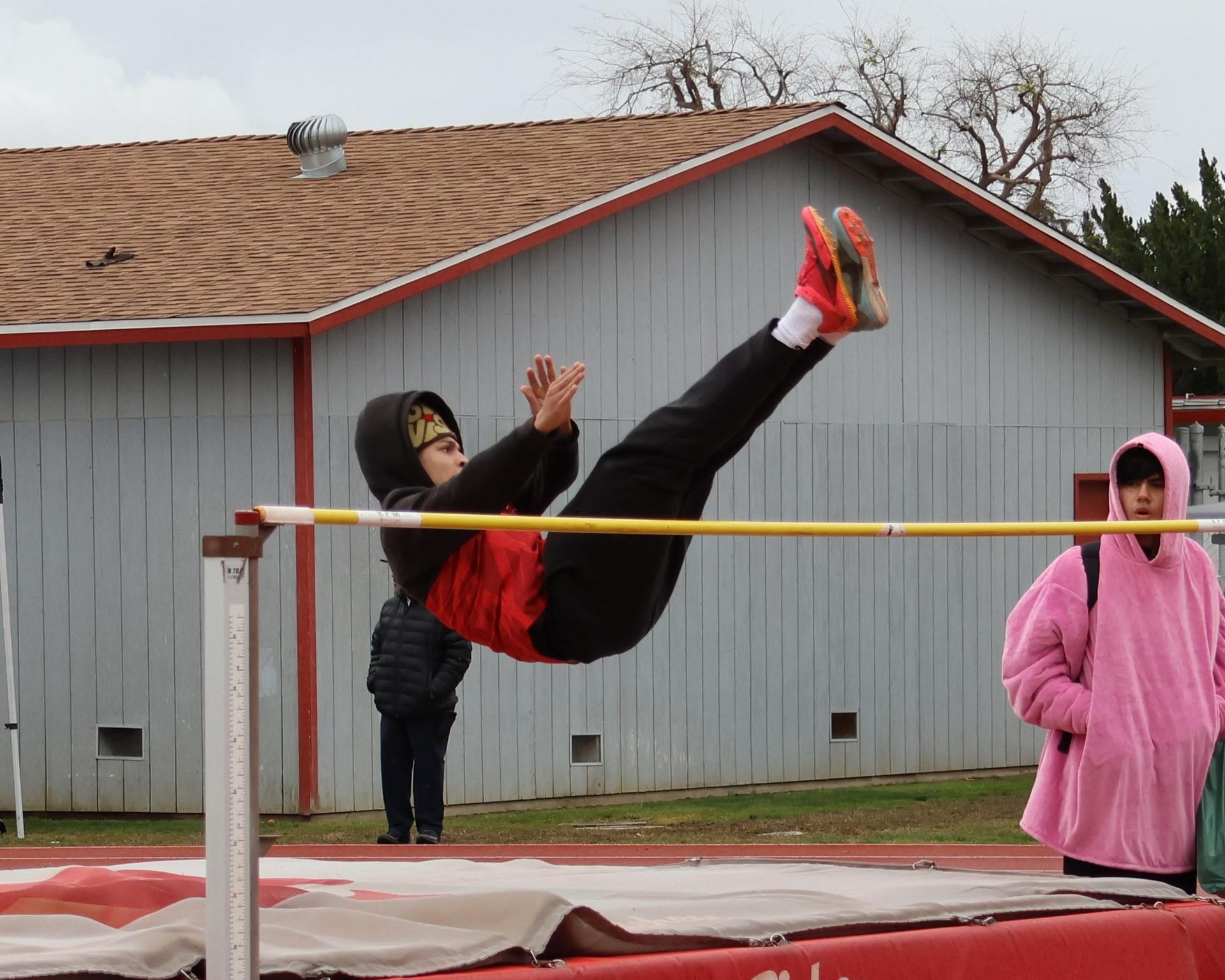 varsity boys high jumping