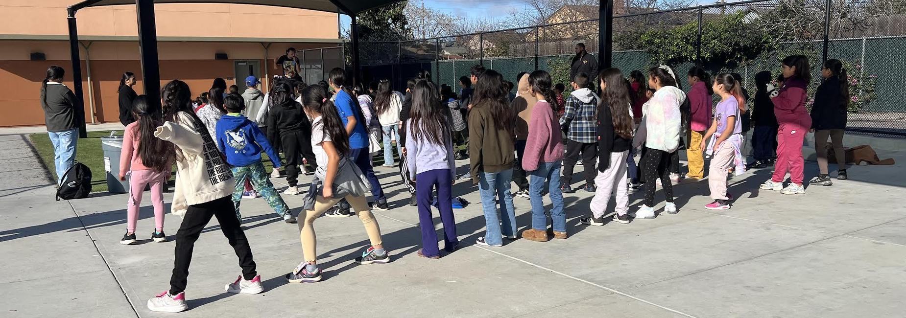group of students dancing