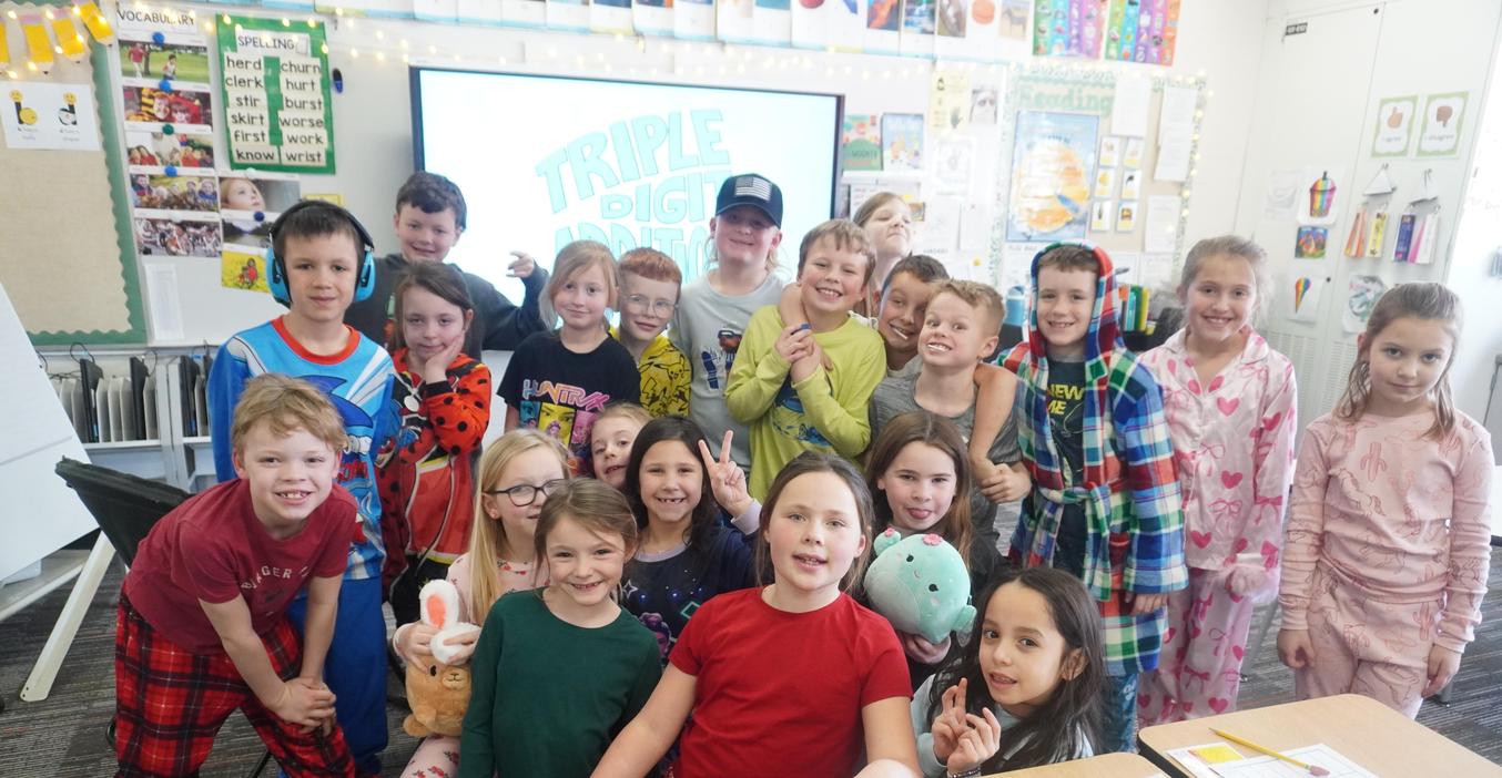 A classroom of students enjoy pajama day!