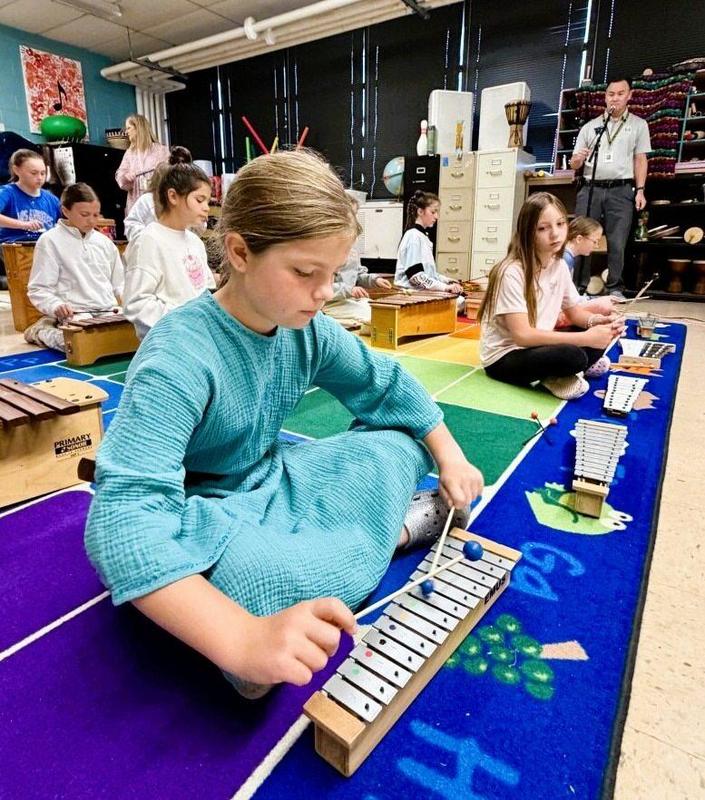 Student playing instrument