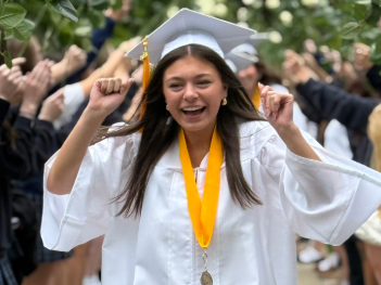 girl walking on graduation day