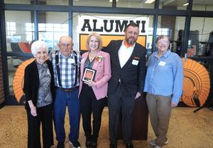 Distinguished alumni Sandi (Stager) Wake is joined by her family members at the dinner.
