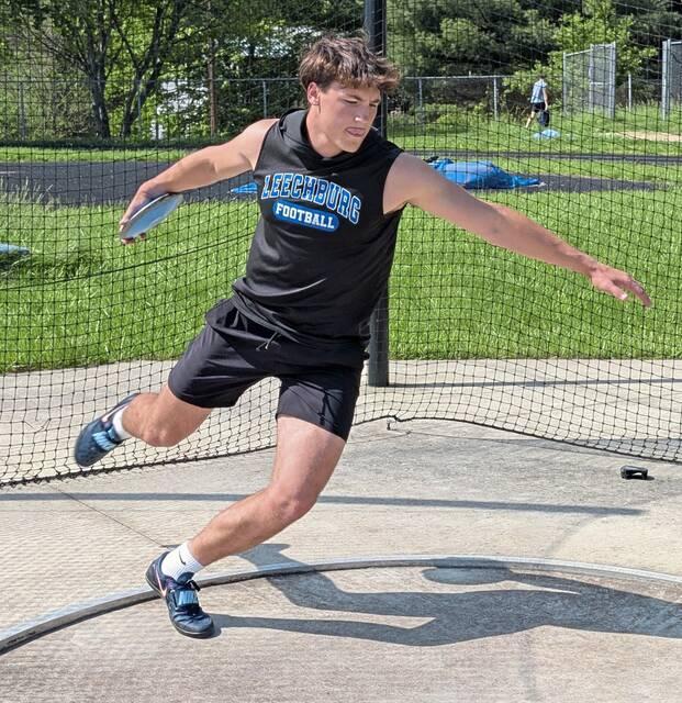 Leechburg junior Nick Hilty throws the discus in practice next to Veteran’s Memorial Stadium on Monday, May 18, 2026. (Michael Love | TribLive)