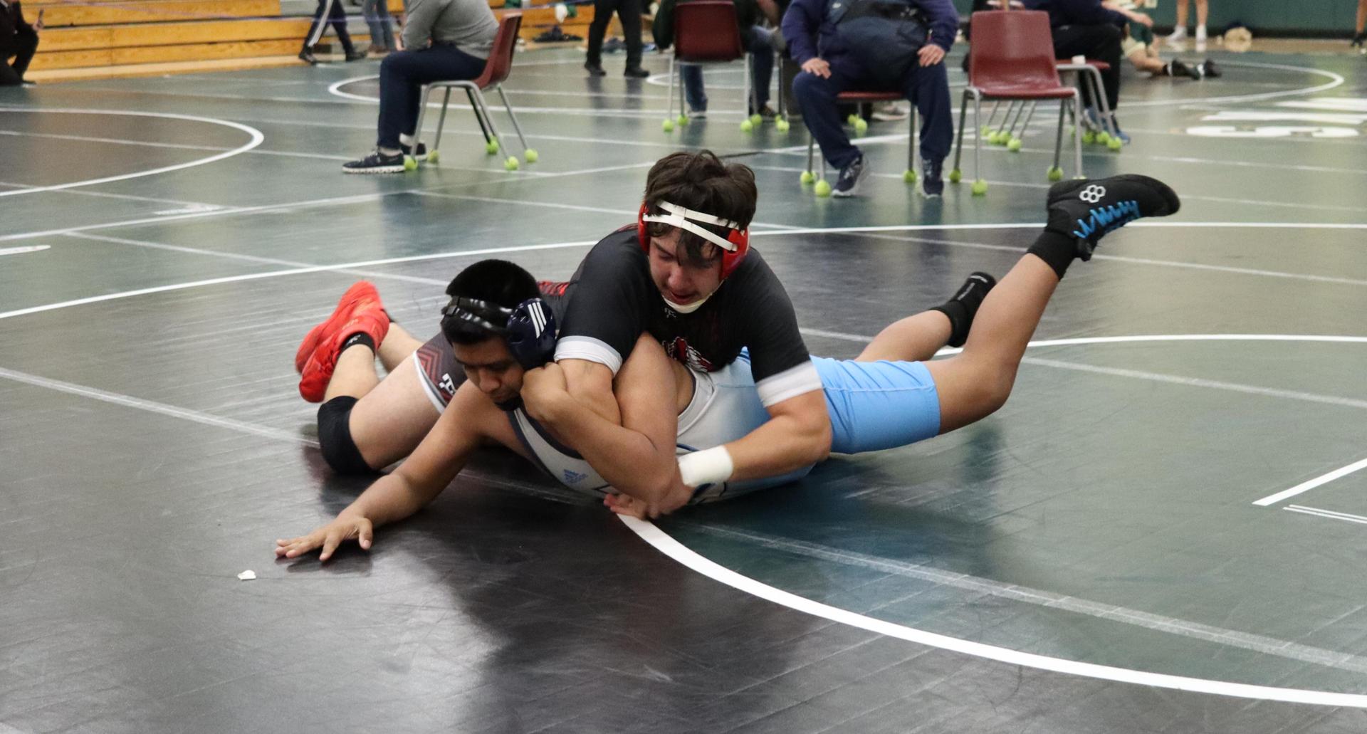 wrestlers in action at the Hawks invitational