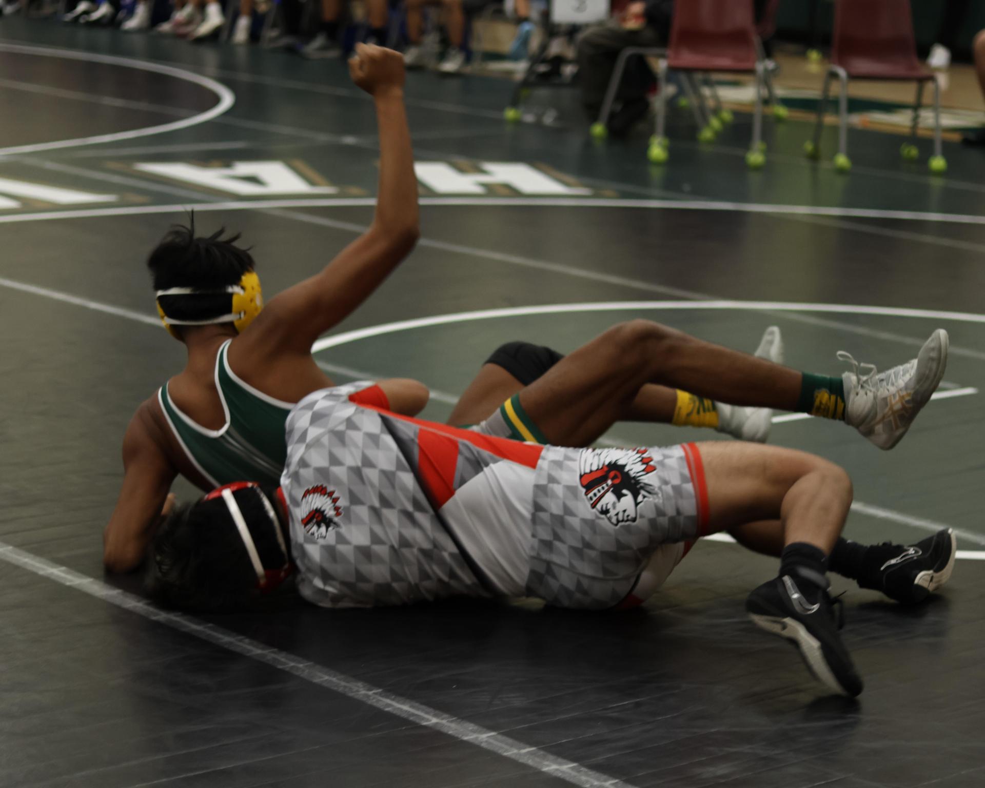 boys wrestling at liberty duals