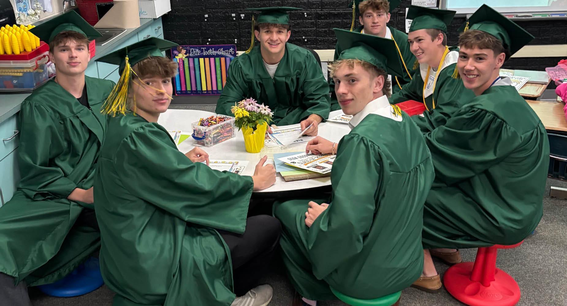 Daniel Lerro, Matthew Lerro, Sean Goodman, Jake Lenart, Luke Fox, Cameron King, and Niko Cox take a seat during their walk through at Trafford Elementary