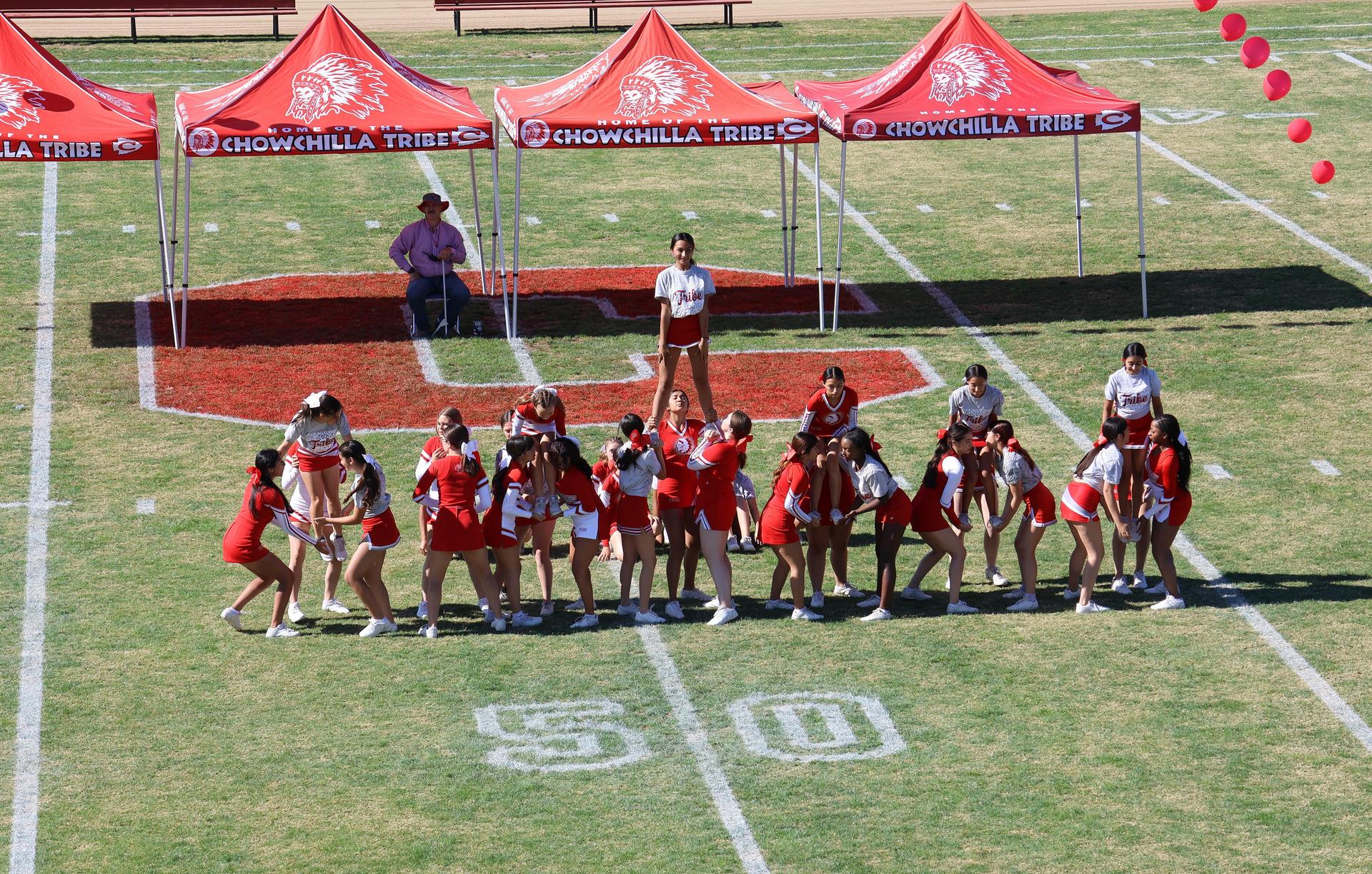 students and staff at the homecoming rally