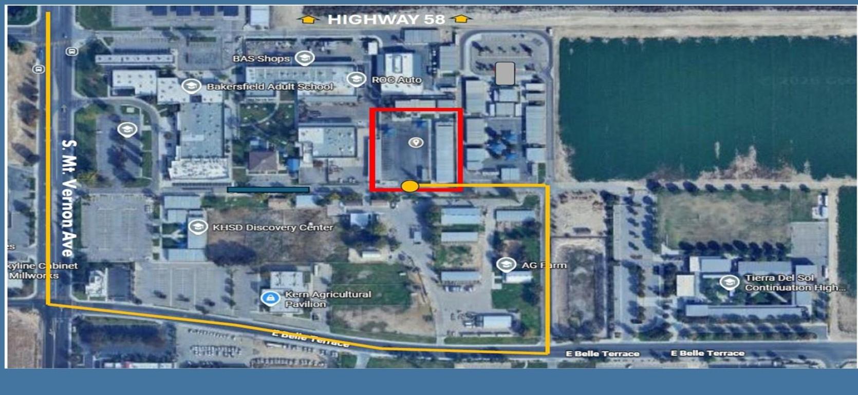 Aerial map showing a marked area with nearby streets and buildings.