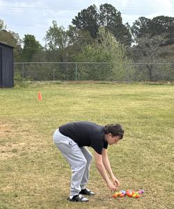 Life Skills kids hunting Easter eggs.