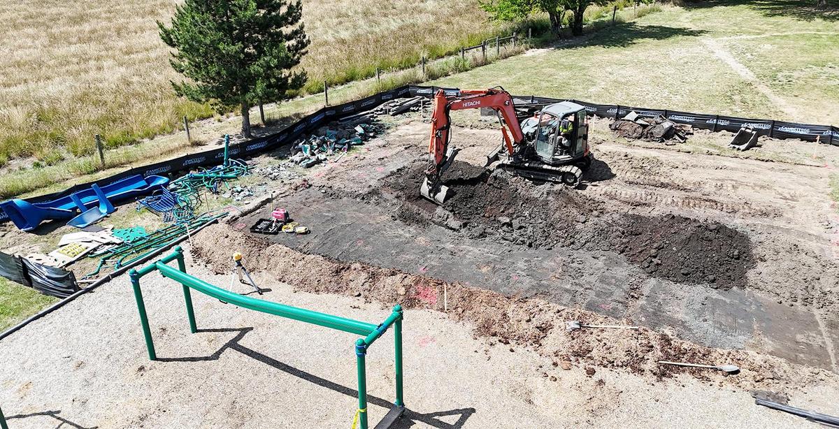 aerial view of old playground being excavated