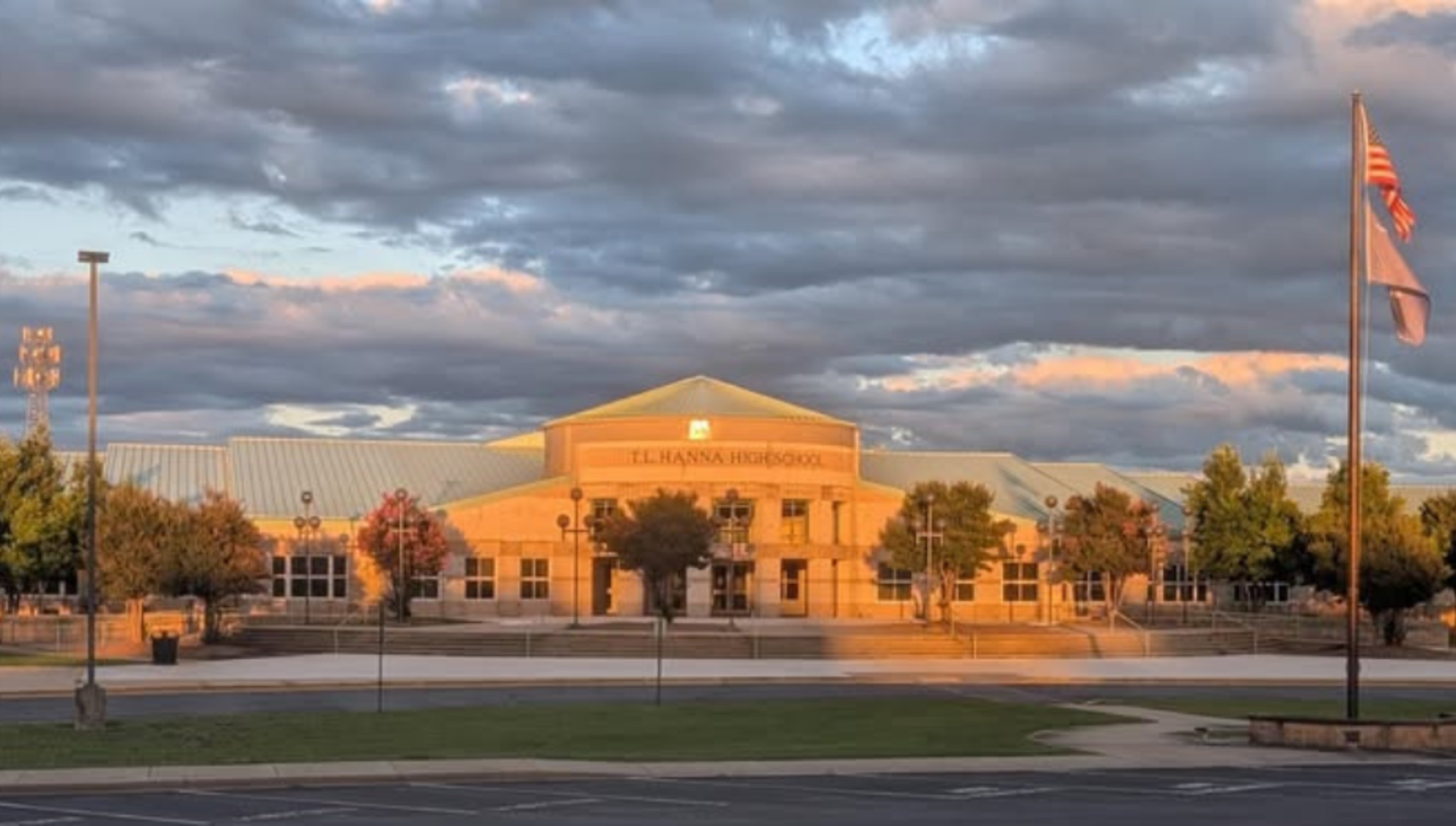 Picture of TL Hanna High School at sunset