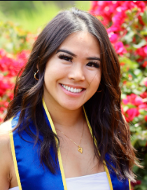 Close-up portrait of Julia Lo, wearing a white top.