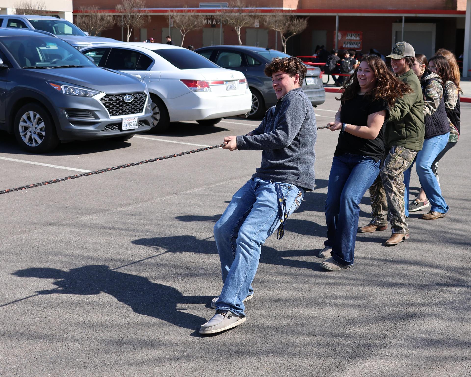students and staff enjoying the truck pull