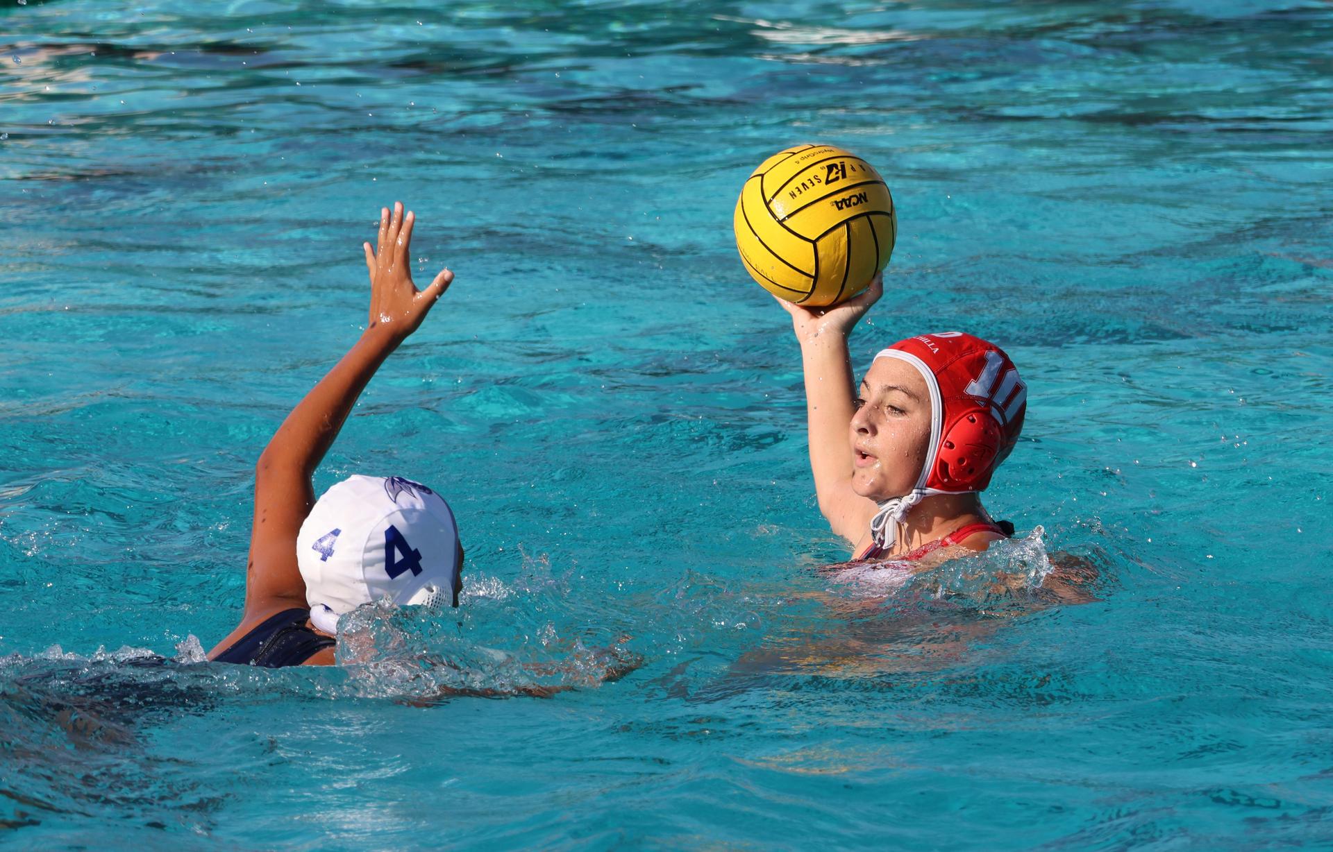 girls playing water polo against Sanger West