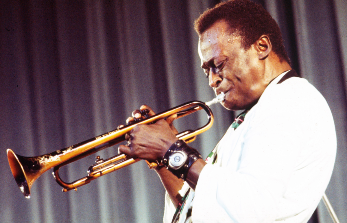 MIles Davis with trumpet image
