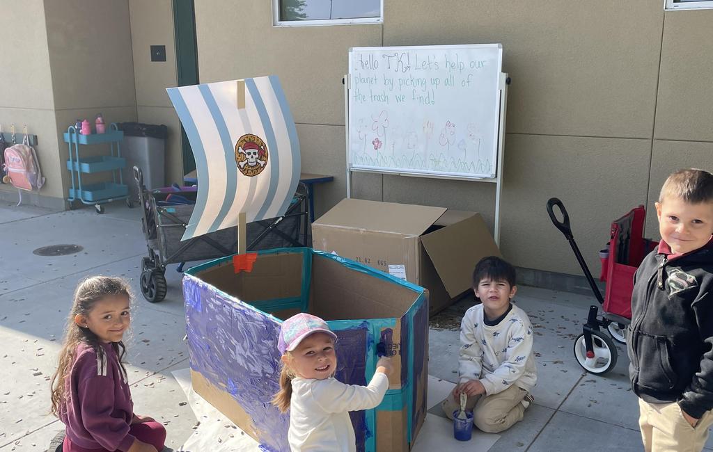 Students making a pirate boat