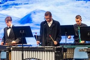 Members of the percussion ensemble on stage